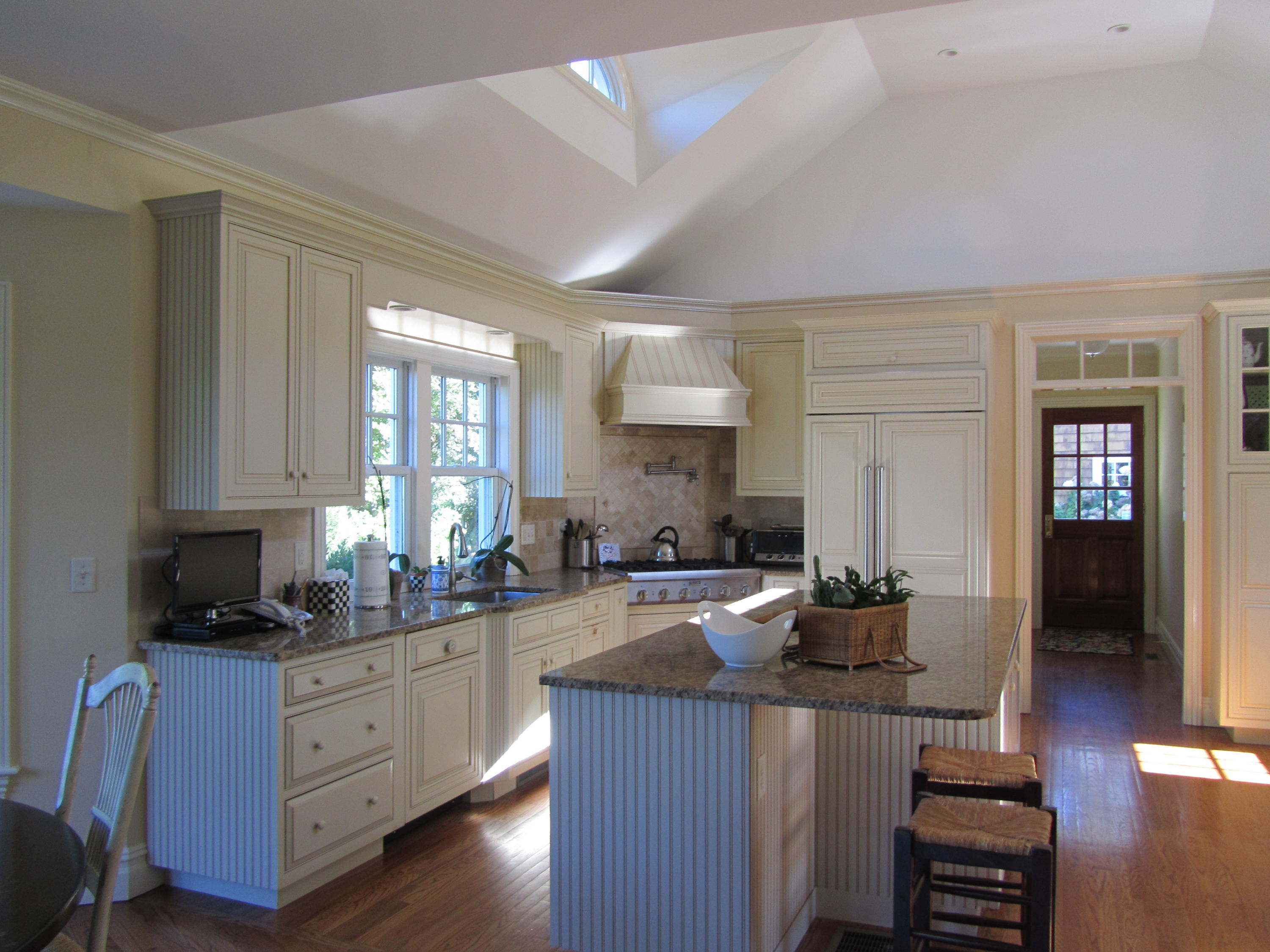 130 Main Street Osterville, MA 02655 - Photo 21 of 34 a kitchen with sink a stove and cabinets
