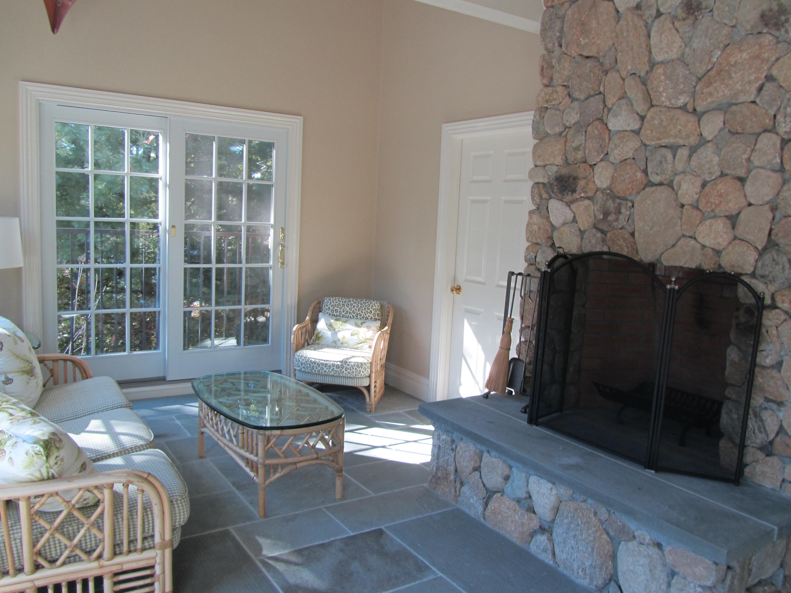 130 Main Street Osterville, MA 02655 - Photo 29 of 34 a living room with furniture and a fireplace