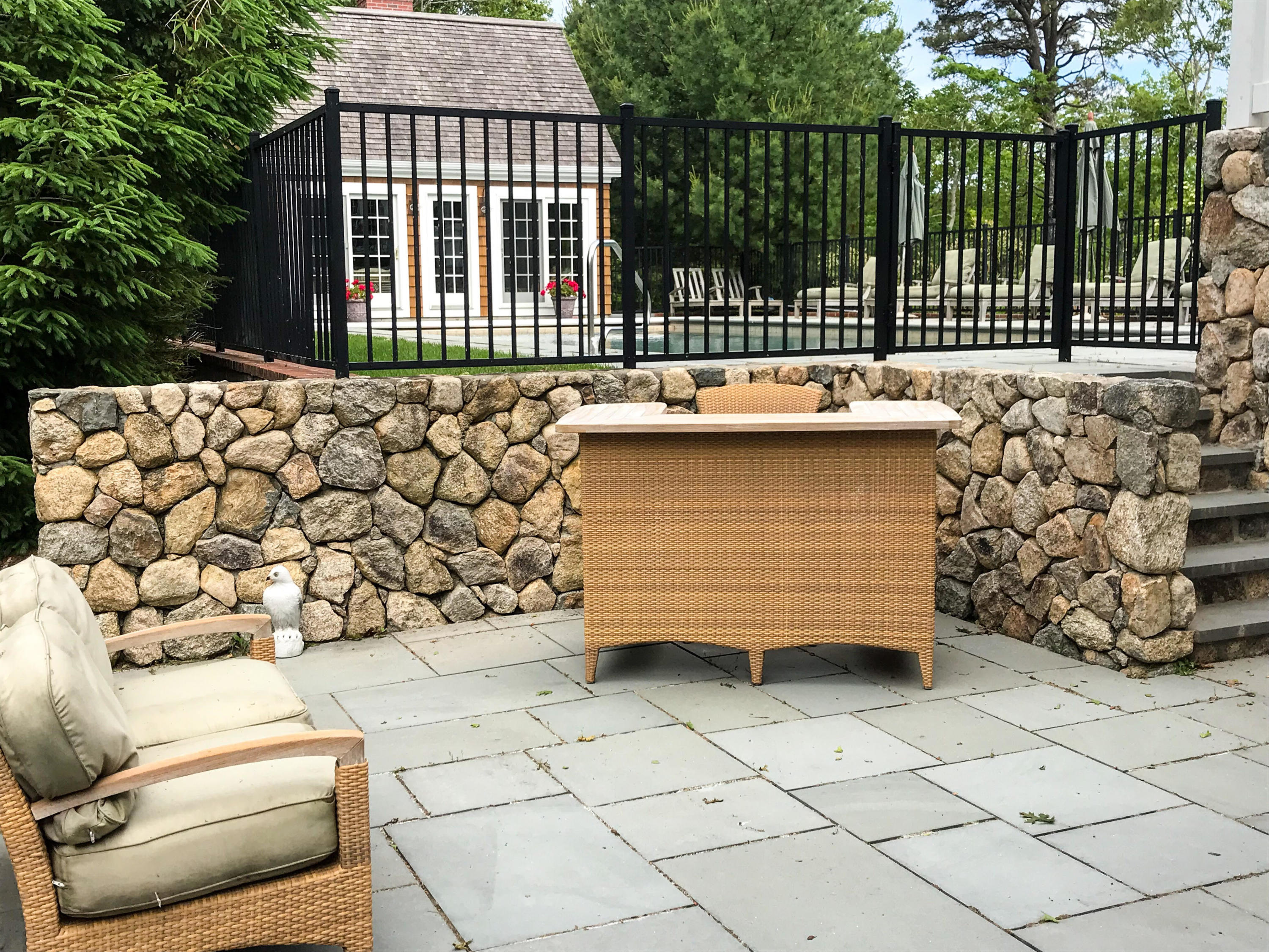 130 Main Street Osterville, MA 02655 - Photo 31 of 34 a view of a house with a wooden fence