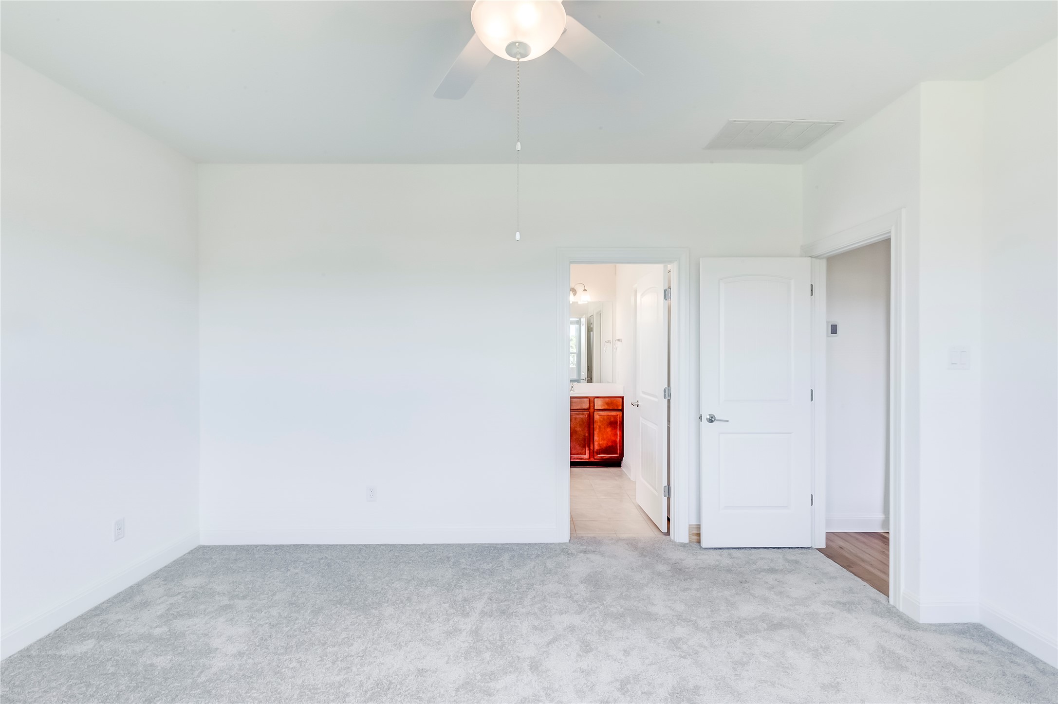 132 Inlet Lane Leander, TX 78641 - Photo 18 of 36 Spare room featuring carpet flooring and ceiling fan