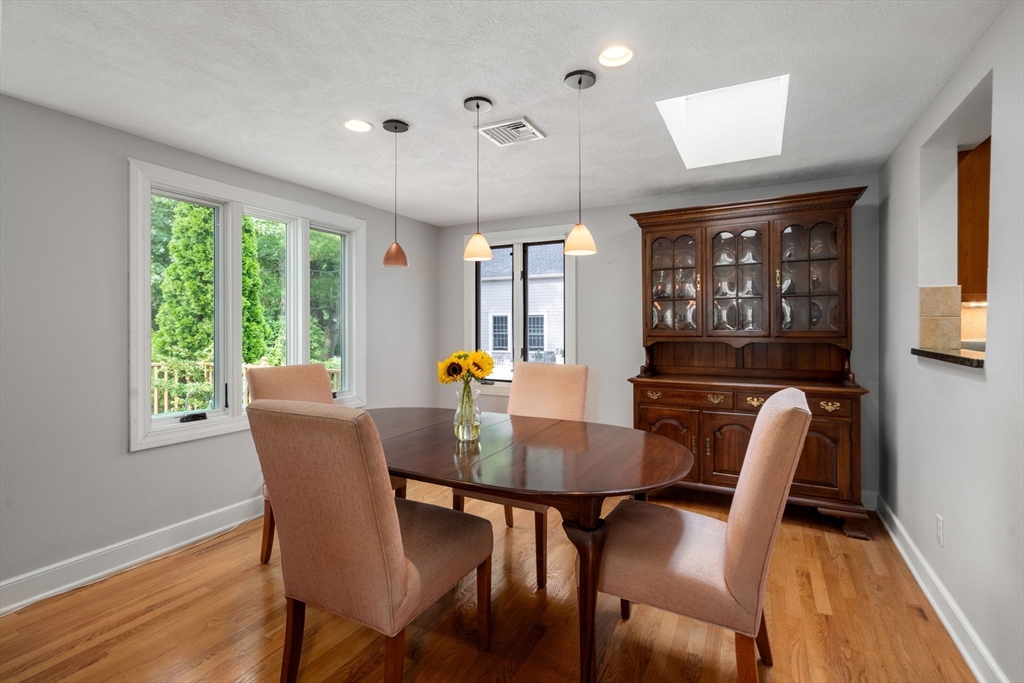10 Strathmore Road Wellesley, MA 02482 - Photo 8 of 26 a view of a dining room with furniture window and wooden floor