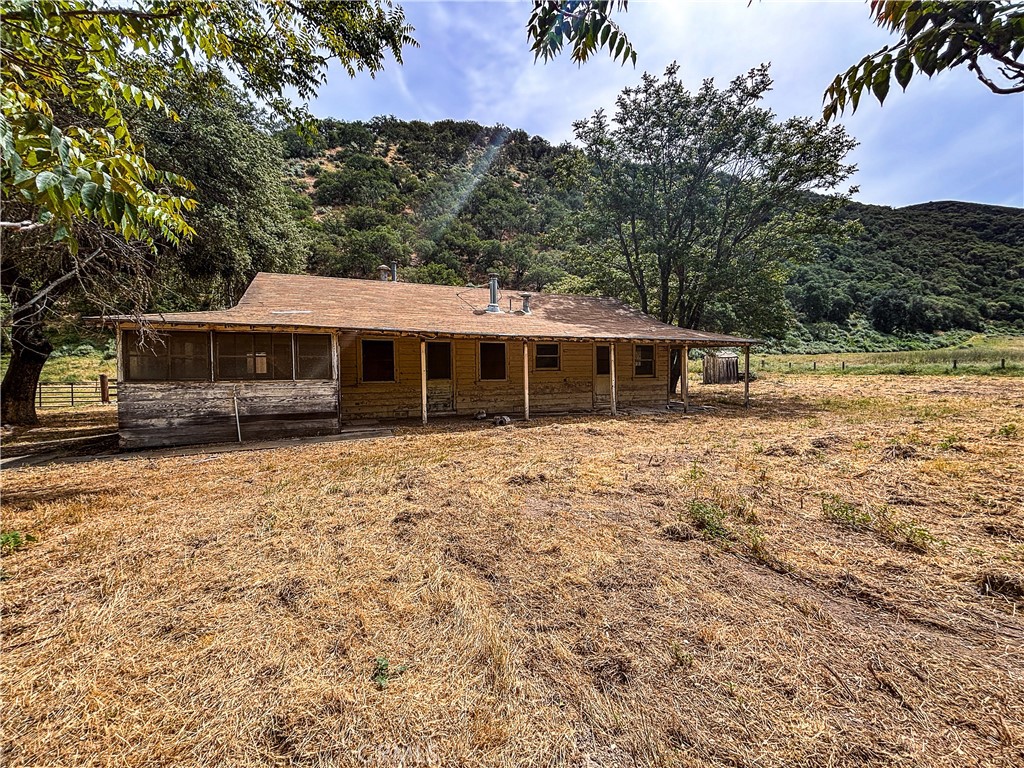 124 Lockwood San Ardo Road San Ardo, CA 93450 - Photo 10 of 13 a front view of a house with a yard