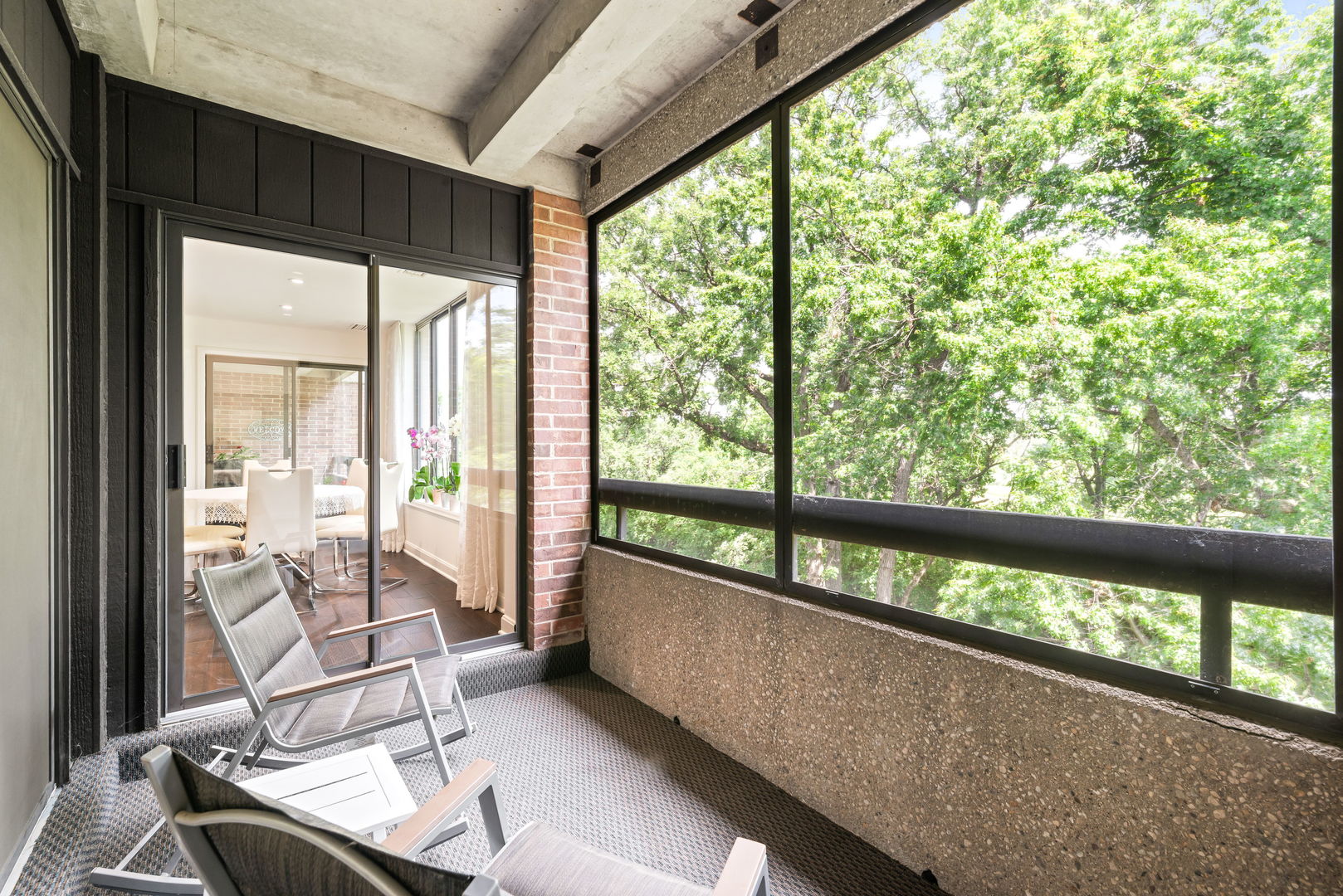 1409 Burr Oak Road, Unit 315A Hinsdale, IL 60521 - Photo 14 of 20 a view of a large room with wooden floor and windows