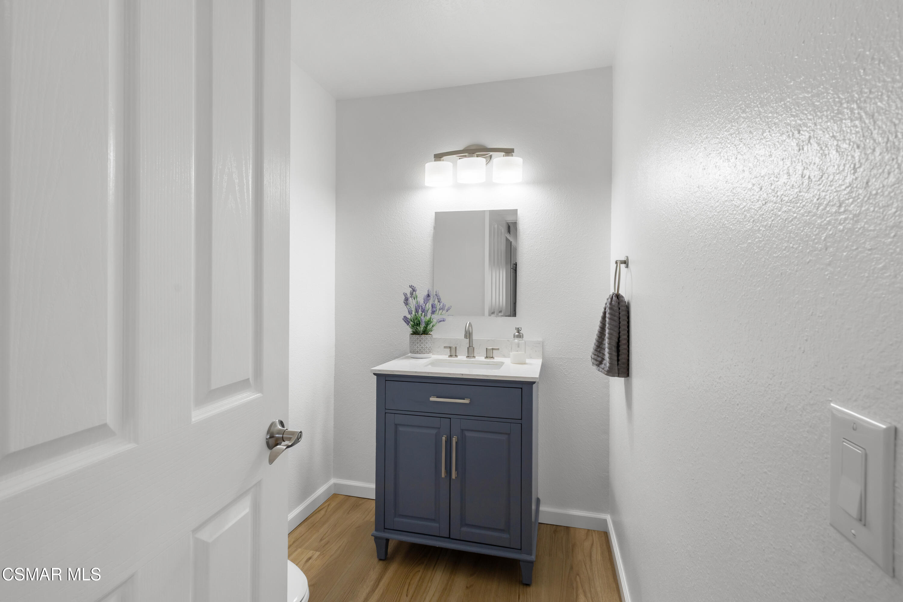 489 4th Place Port Hueneme, CA 93041 - Photo 16 of 34 a bathroom with a sink and a mirror