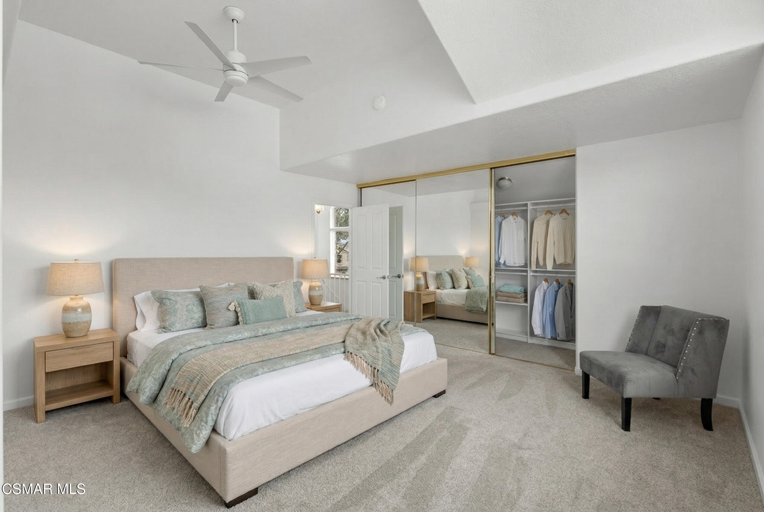 489 4th Place Port Hueneme, CA 93041 - Photo 22 of 34 a spacious bedroom with a bed and a couch