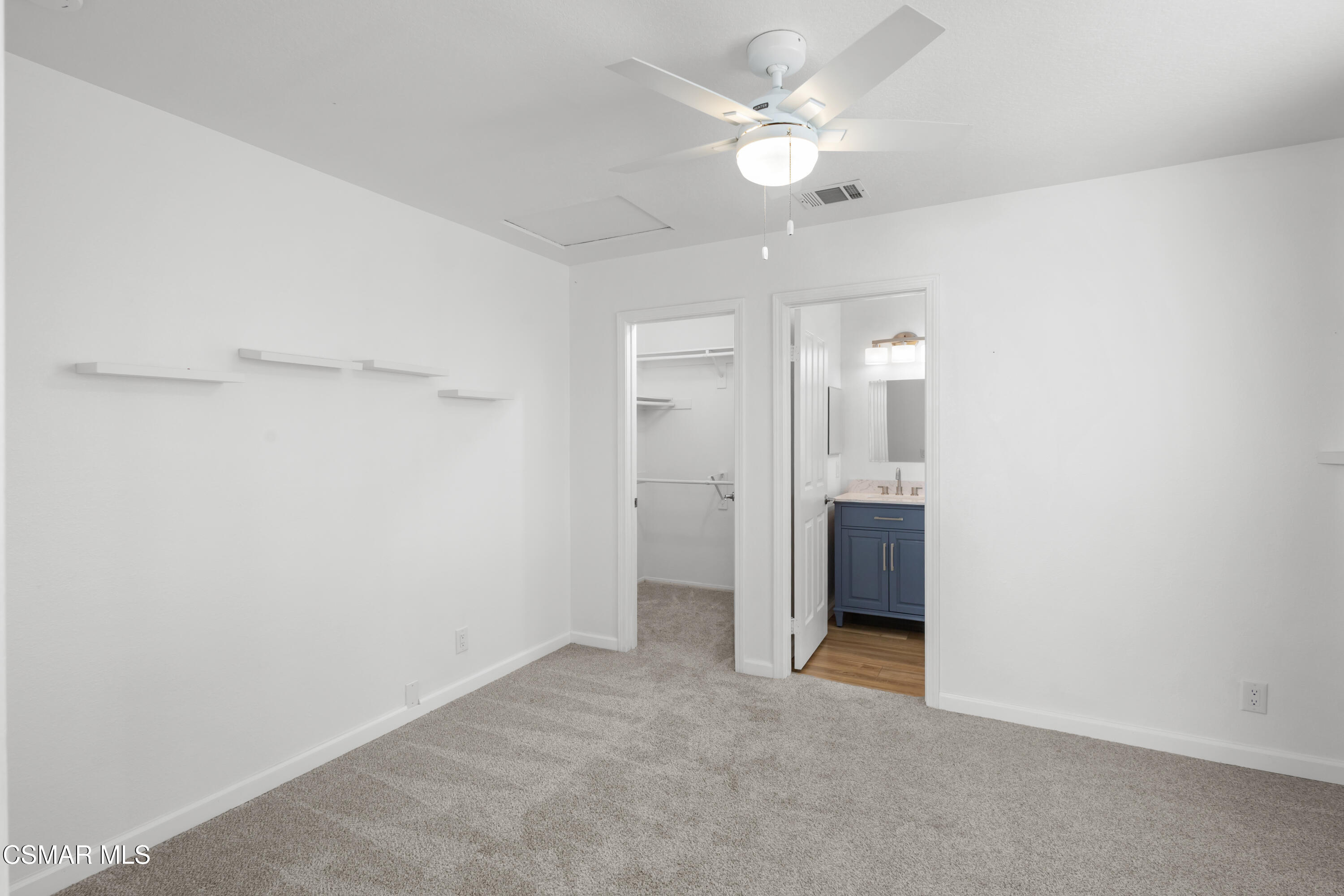 489 4th Place Port Hueneme, CA 93041 - Photo 24 of 34 an empty room with a ceiling fan and a bathroom
