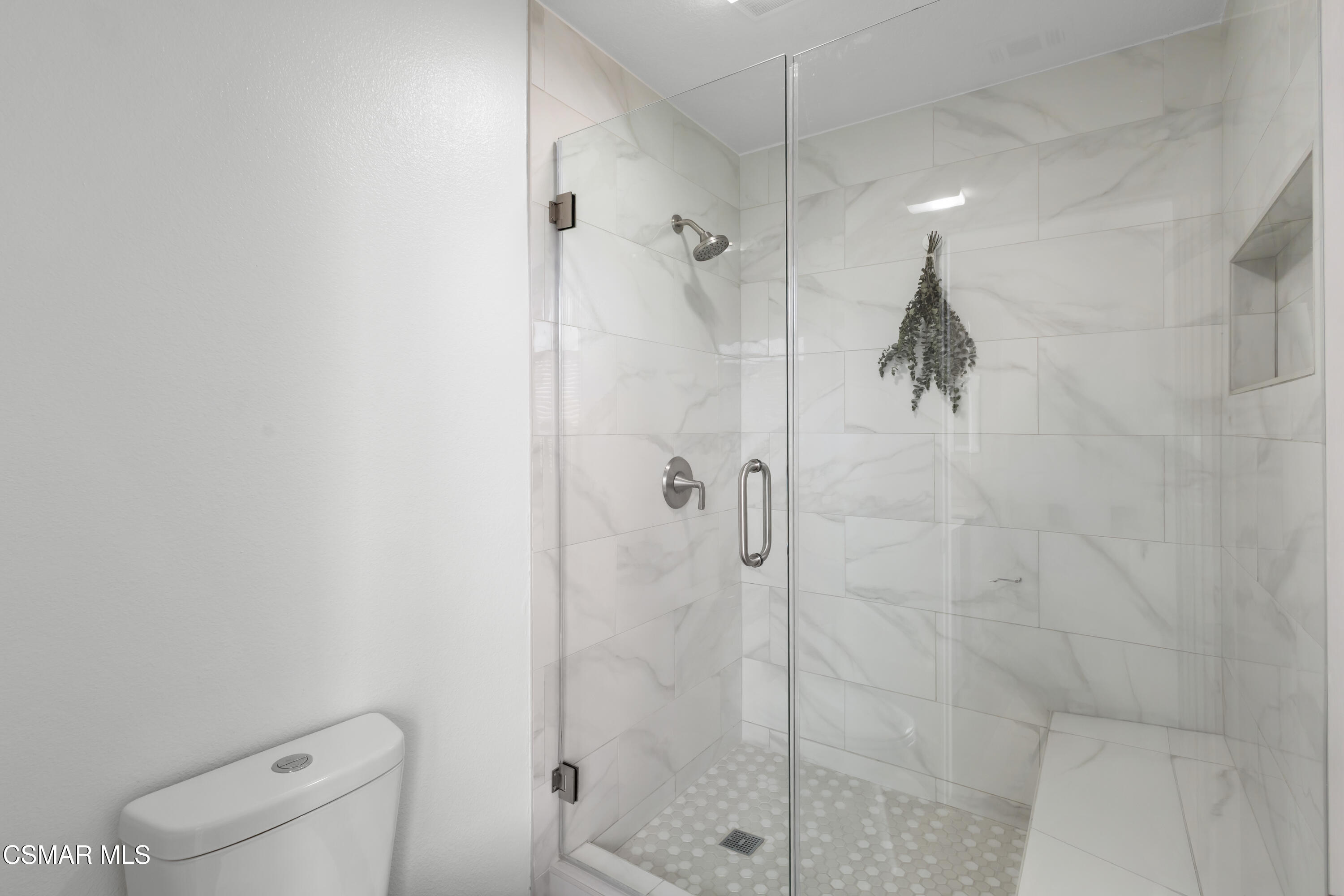 489 4th Place Port Hueneme, CA 93041 - Photo 27 of 34 a bathroom with a shower and toilet