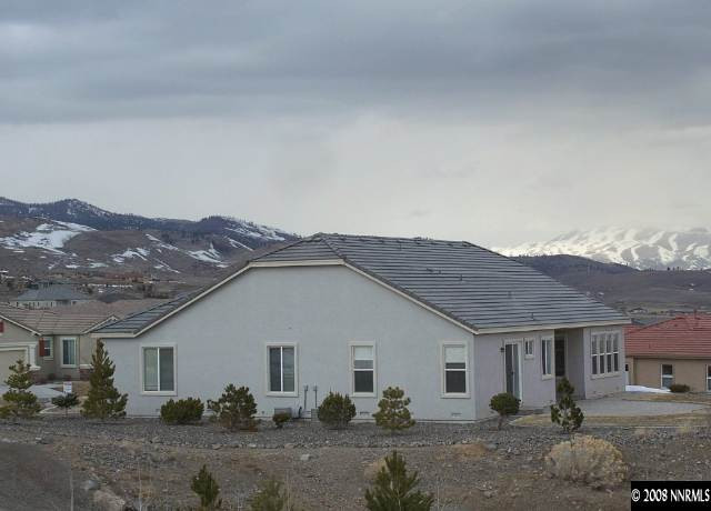 5585 North White Sands Road Reno, NV 89511 - Photo 8 of 9 a view of house with a street