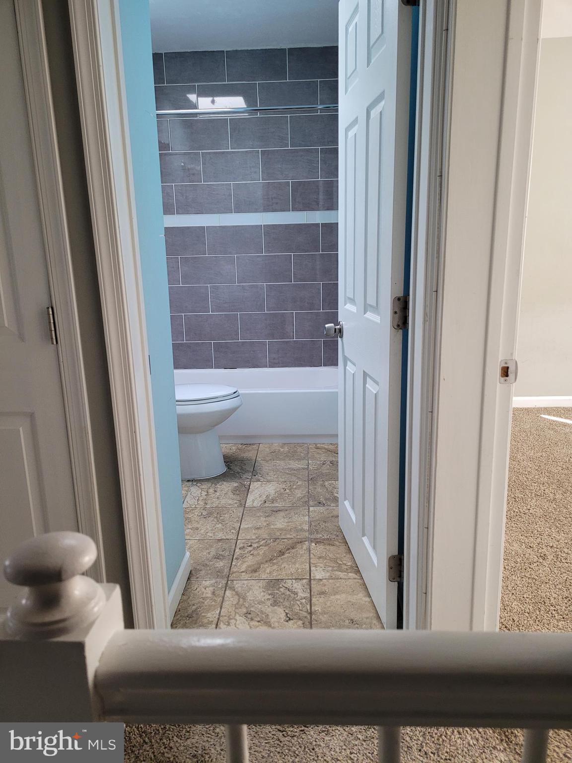 7564 Westfield Road Baltimore, MD 21222 - Photo 10 of 12 FULL BATH UPSTAIRS & 1/2 BATH IN BASEMENT