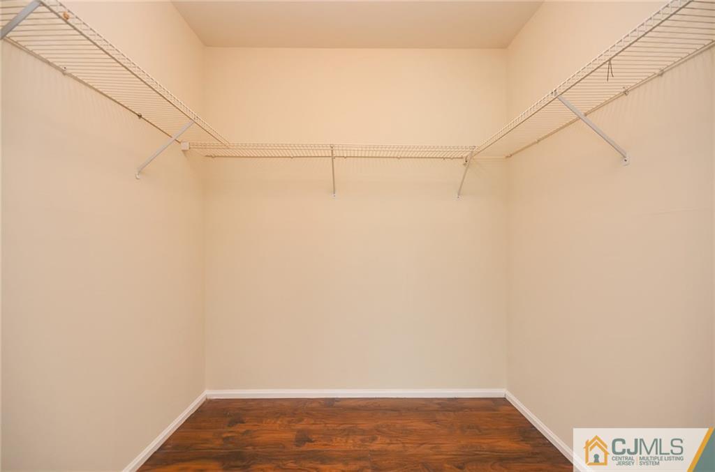 1401 Plymouth Road North Brunswick, NJ 08902 - Photo 16 of 25 a view of a room with wooden floor