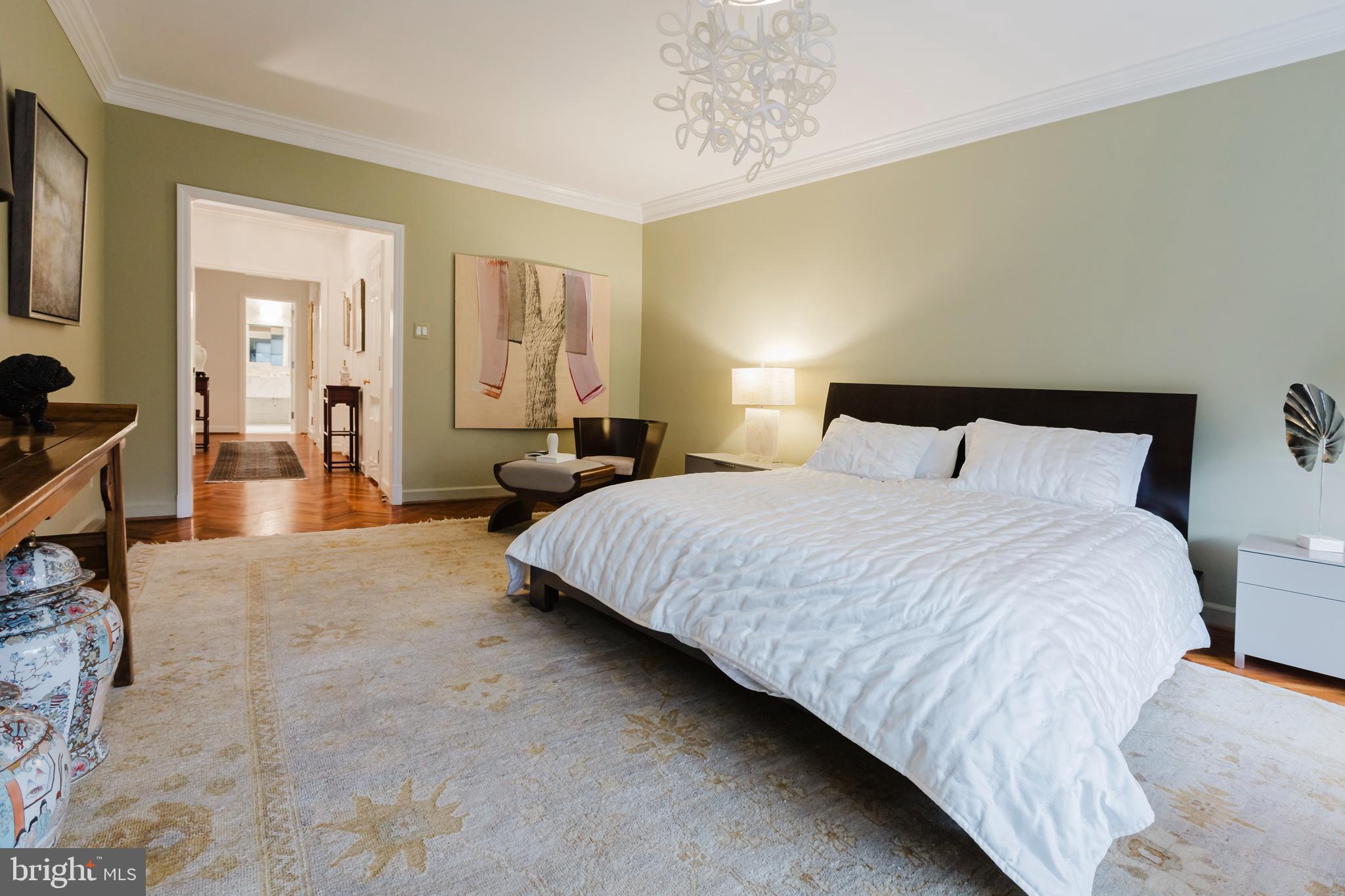 2700 Calvert Street Northwest, Unit 217 Washington, DC 20008 - Photo 16 of 36 a bedroom with bed and large windows