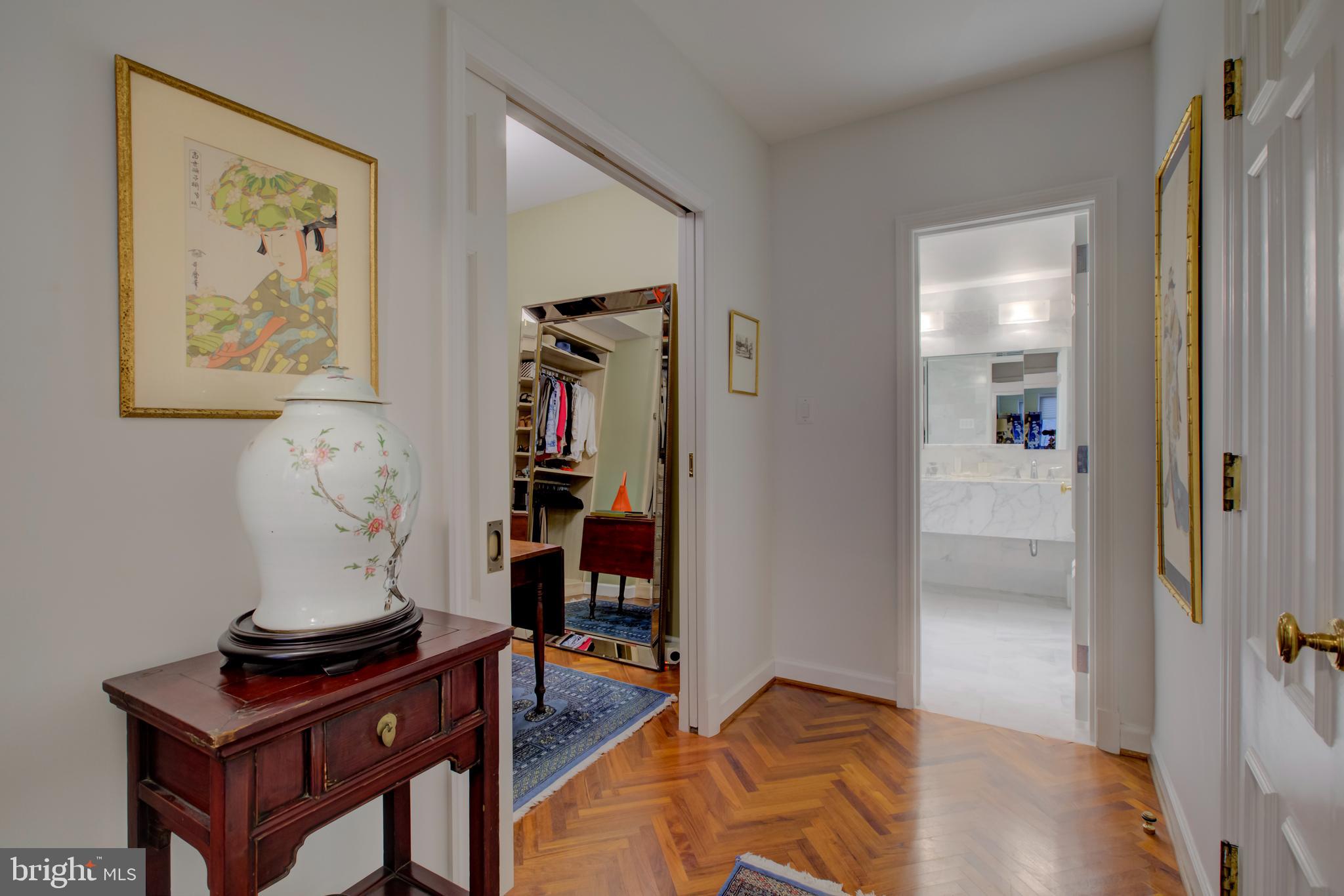 2700 Calvert Street Northwest, Unit 217 Washington, DC 20008 - Photo 18 of 36 a living room with furniture and wooden floor