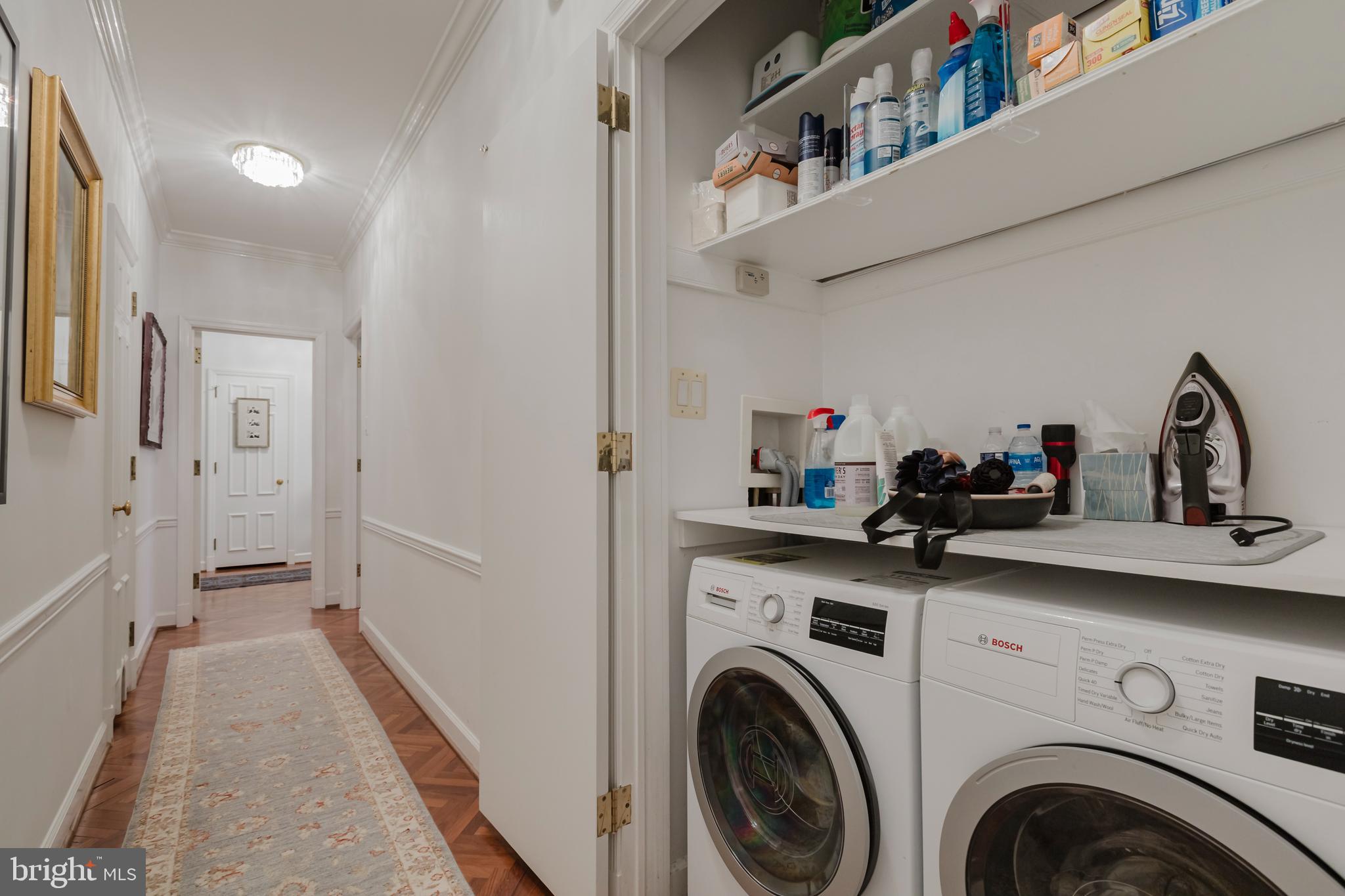 2700 Calvert Street Northwest, Unit 217 Washington, DC 20008 - Photo 24 of 36 a view of entryway with washer and dryer