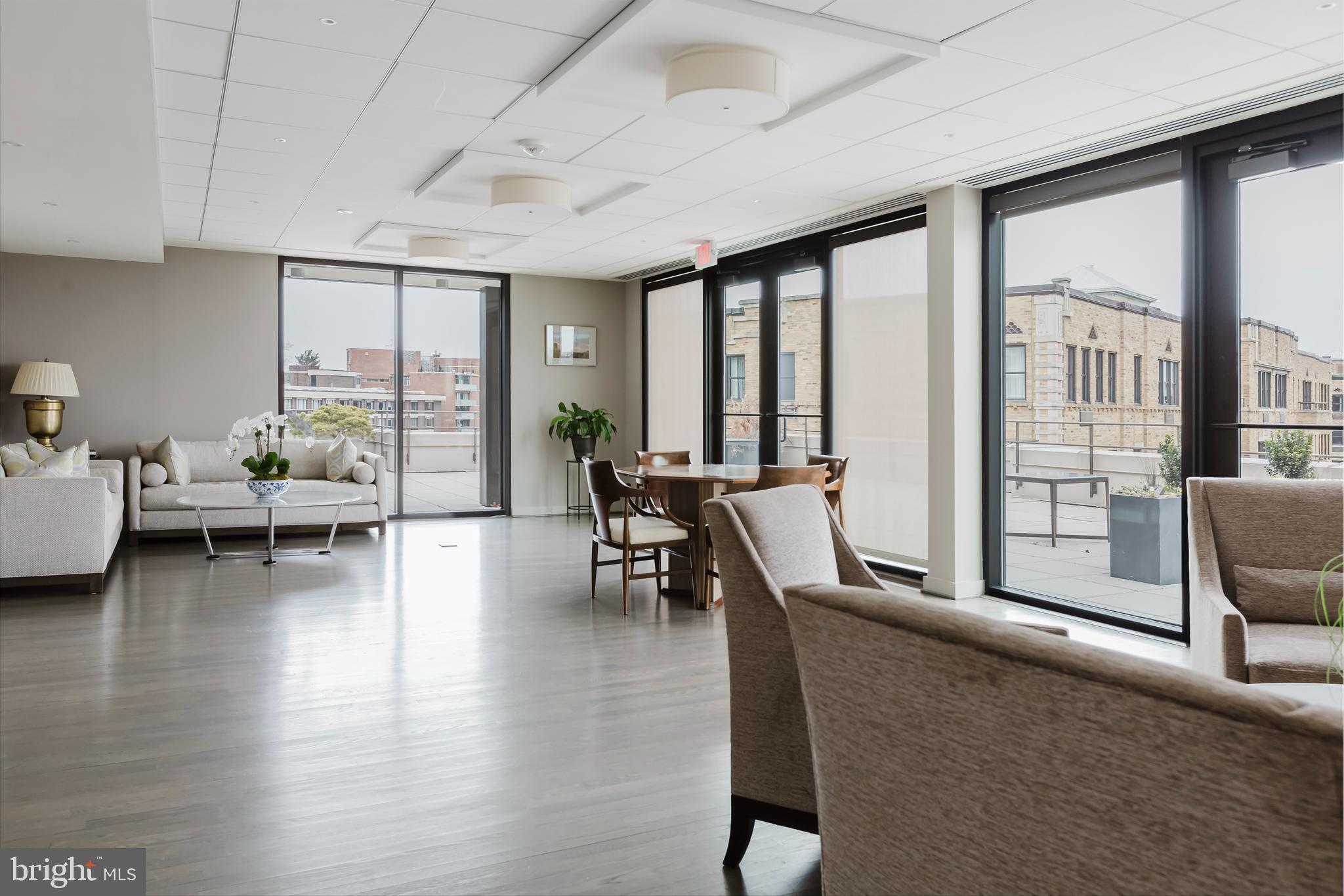 2700 Calvert Street Northwest, Unit 217 Washington, DC 20008 - Photo 32 of 36 a living room with furniture and a large window