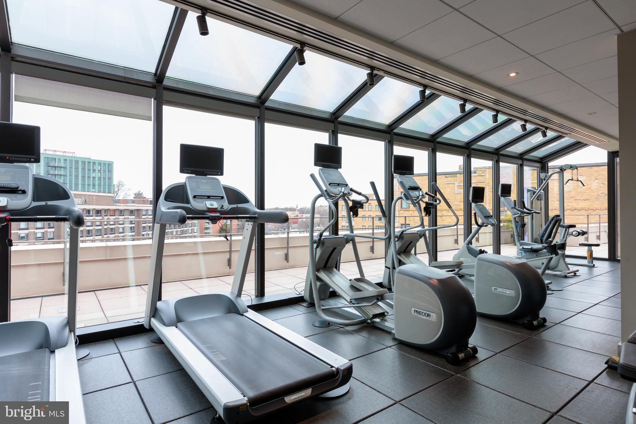 2700 Calvert Street Northwest, Unit 217 Washington, DC 20008 - Photo 34 of 36 a room with gym equipment