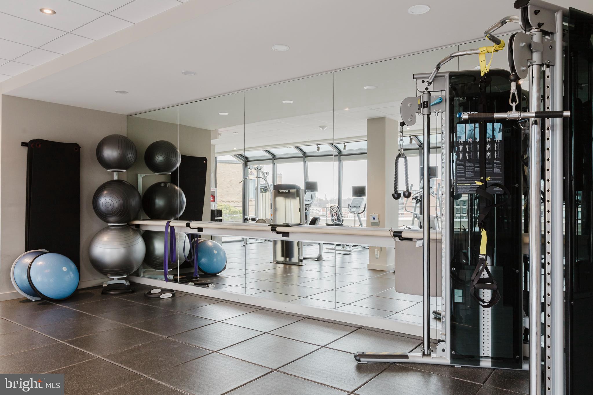 2700 Calvert Street Northwest, Unit 217 Washington, DC 20008 - Photo 35 of 36 a gym hall with exercise machine
