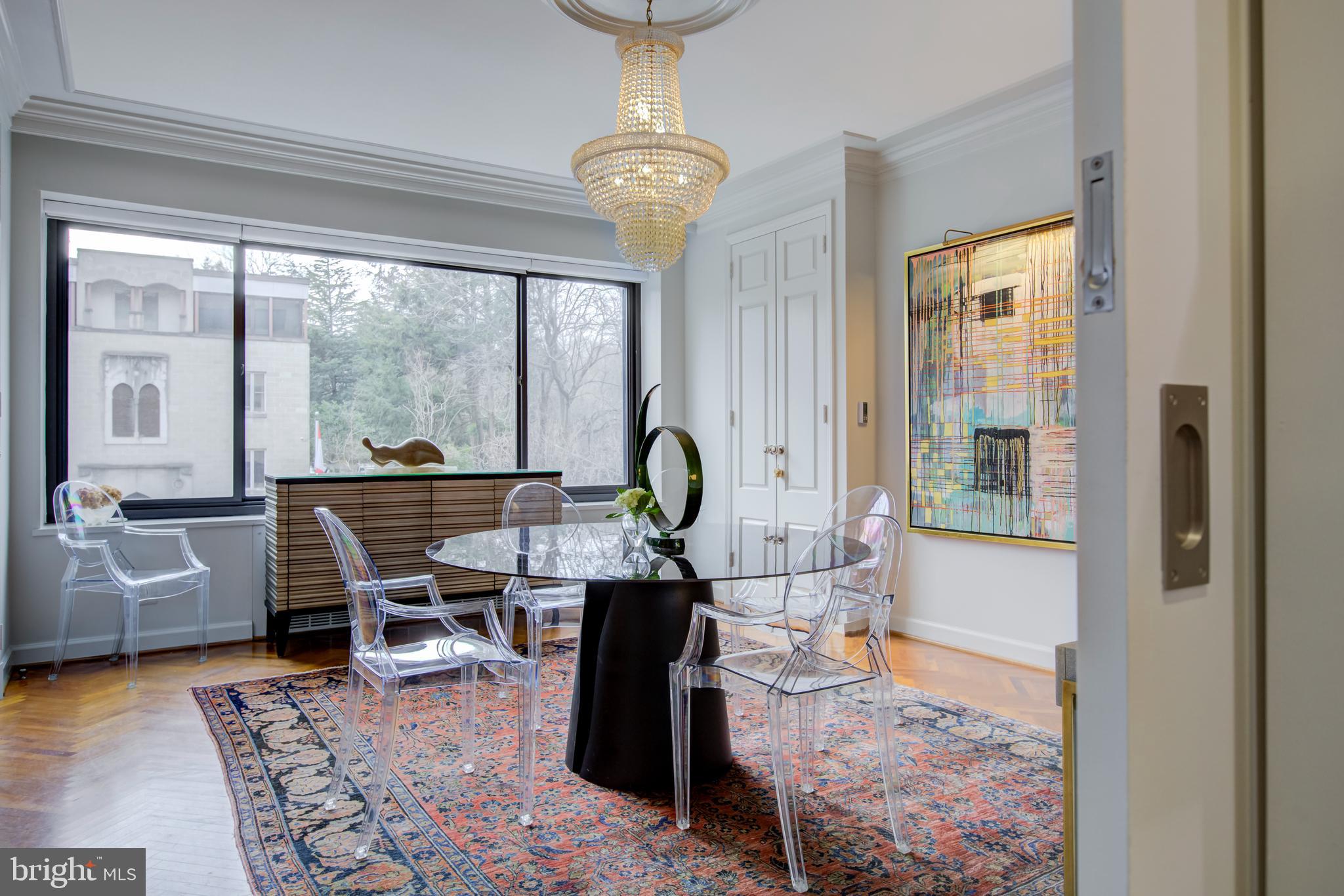 2700 Calvert Street Northwest, Unit 217 Washington, DC 20008 - Photo 7 of 36 a living room with furniture and a large window
