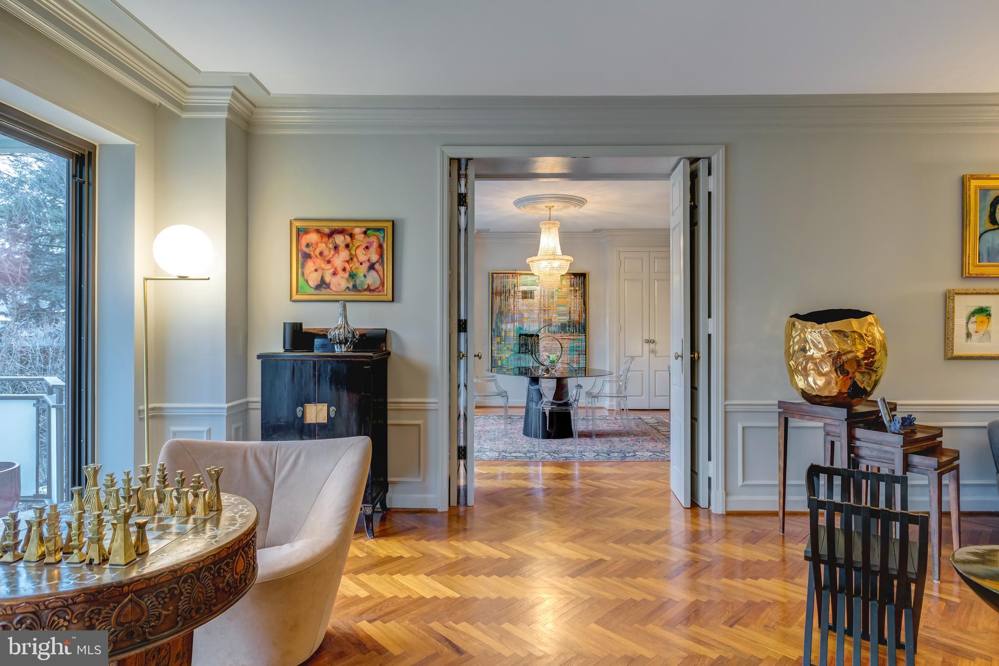 2700 Calvert Street Northwest, Unit 217 Washington, DC 20008 - Photo 8 of 36 a living room with furniture and a table