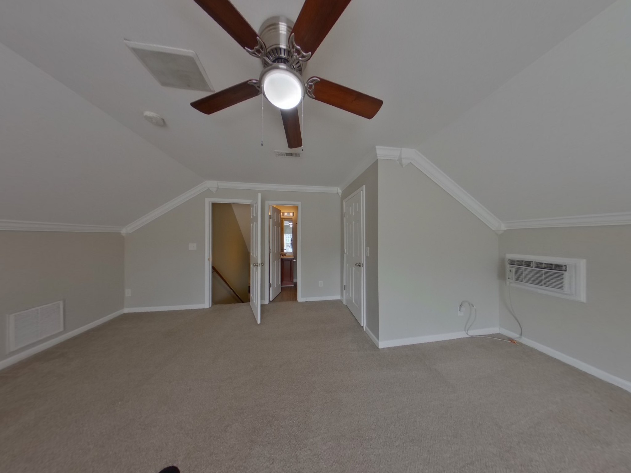 4029 Deer Run Trace Spring Hill, TN 37174 - Photo 12 of 16 an empty room with a chandelier fan and windows