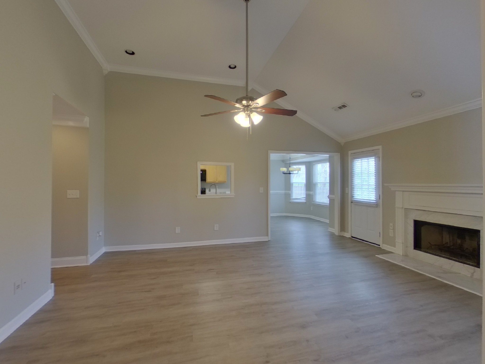 4029 Deer Run Trace Spring Hill, TN 37174 - Photo 3 of 16 a view of an empty room with window and wooden floor