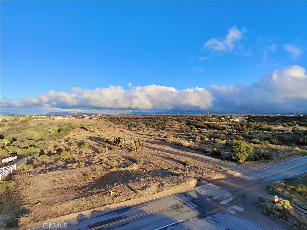 6155 Coleridge Road Hesperia, CA 92344 - Photo 2 of 4 an aerial view of residential houses with outdoor space