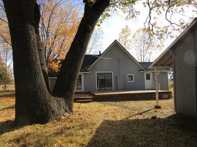40905 Brown Road Fall River Mills, CA 96028 - Photo 13 of 24 a front view of a house with a yard