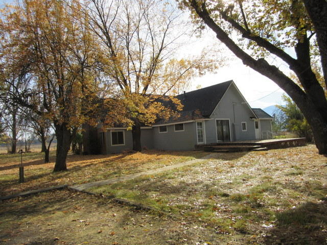40905 Brown Road Fall River Mills, CA 96028 - Photo 15 of 24 a house that has yard in front of it