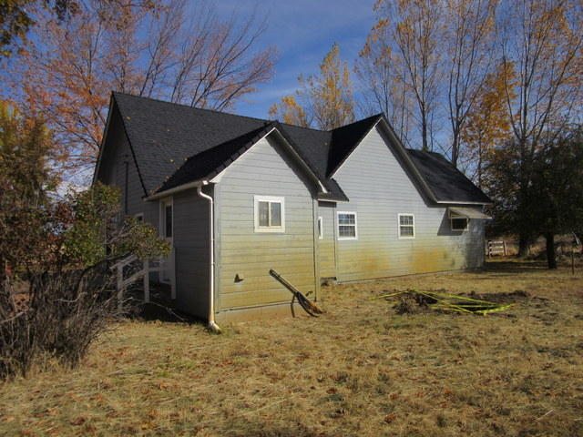 40905 Brown Road Fall River Mills, CA 96028 - Photo 21 of 24 a view of a house with a yard