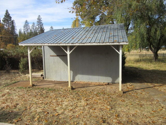 40905 Brown Road Fall River Mills, CA 96028 - Photo 23 of 24 a view of a wooden house with a yard