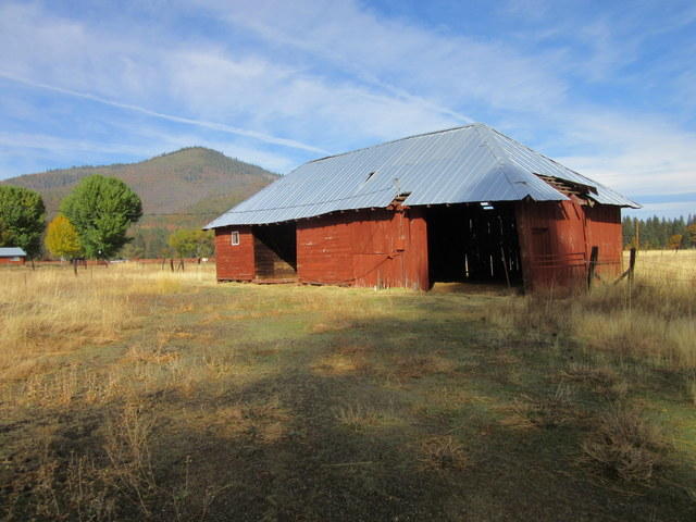 40905 Brown Road Fall River Mills, CA 96028 - Photo 3 of 24 a front view of a house with a yard