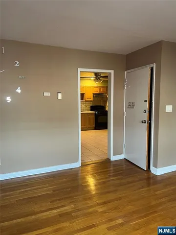 a bathroom with a sink vanity mirror bathtub and shower