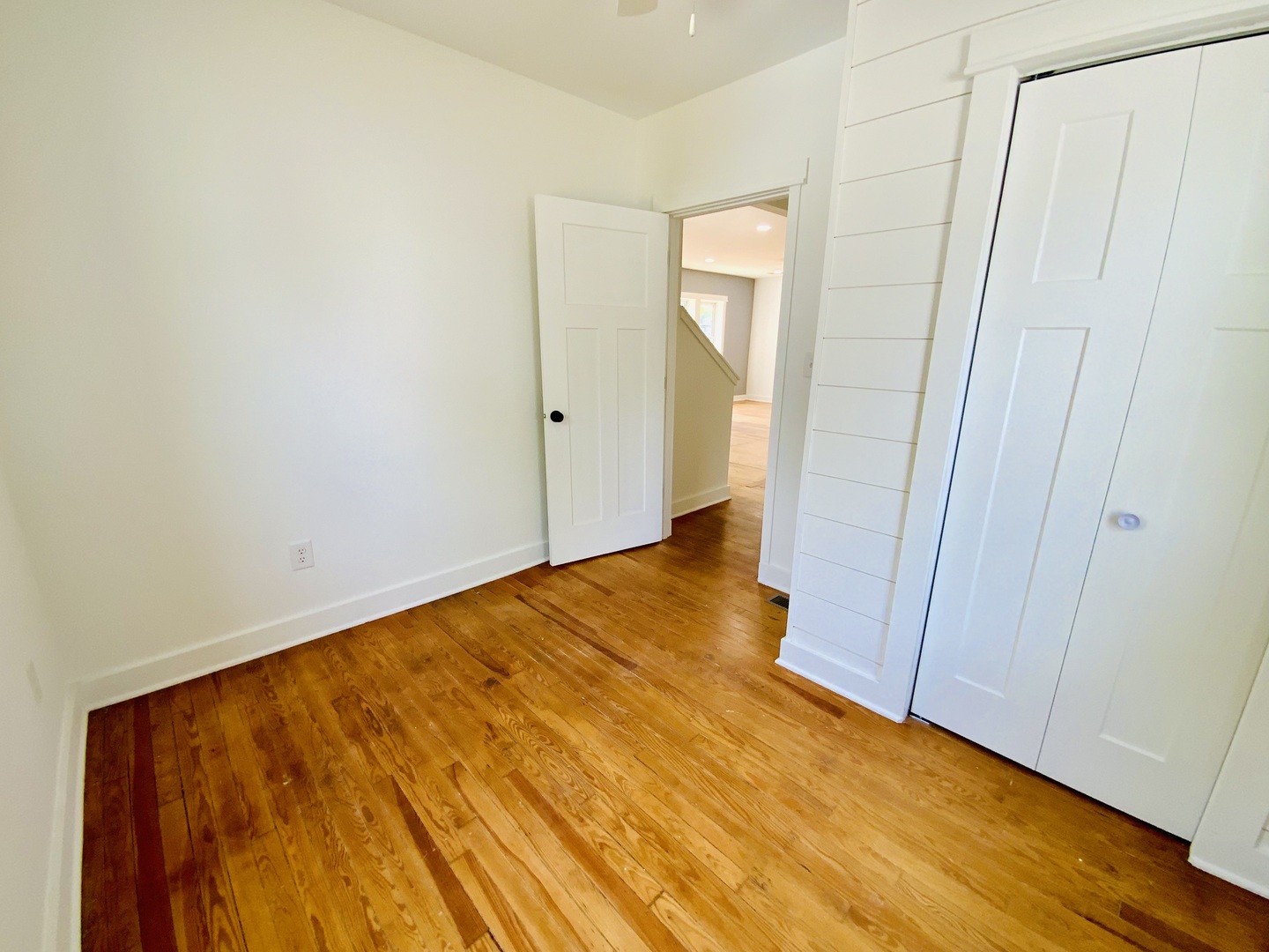 1002 Adams Street Ottawa, IL 61350 - Photo 10 of 14 a view of an empty room with wooden floor