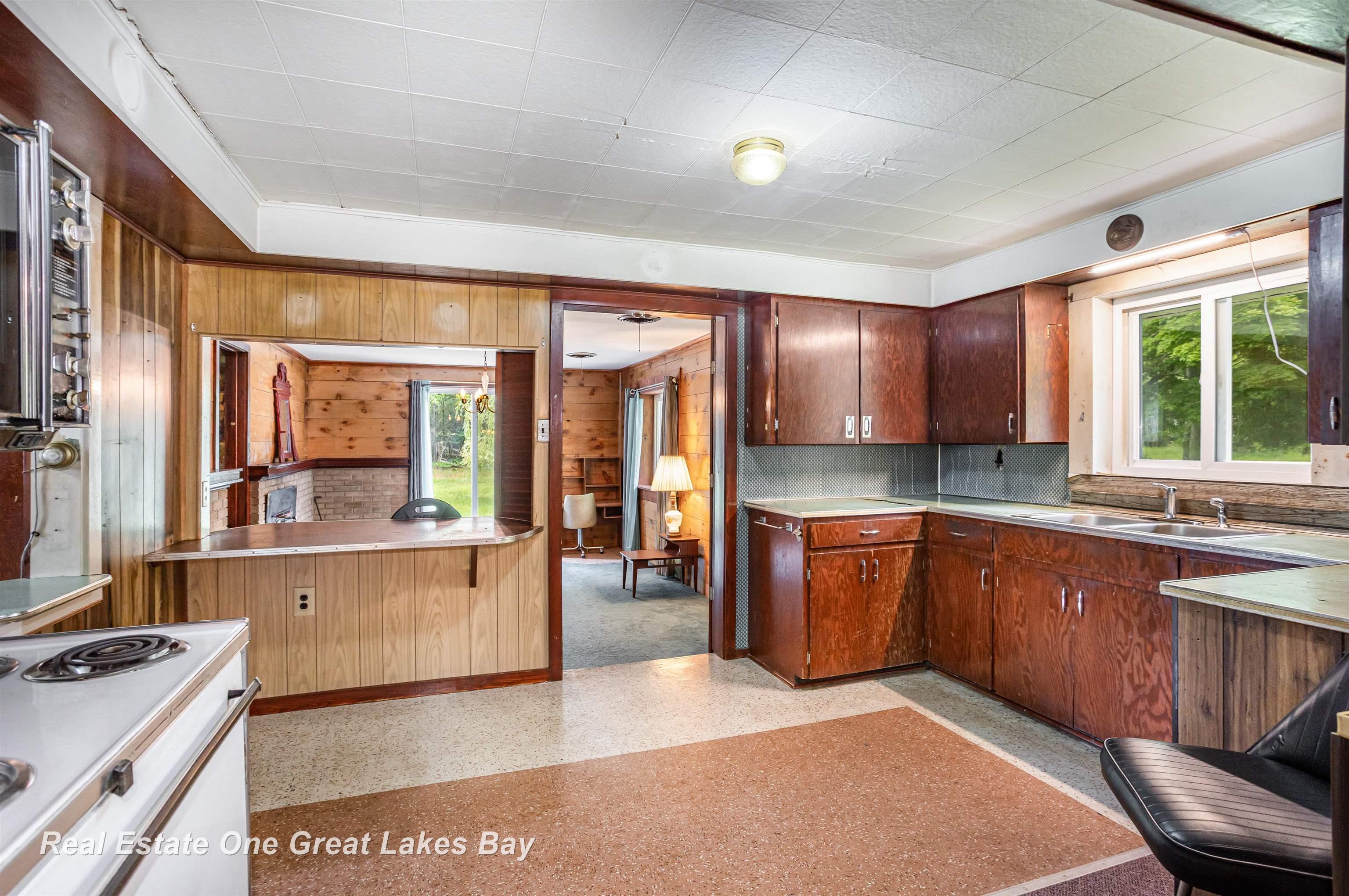 205 North Everett Road Harrisville, MI 48740 - Photo 17 of 39 Kitchen to Sit Area