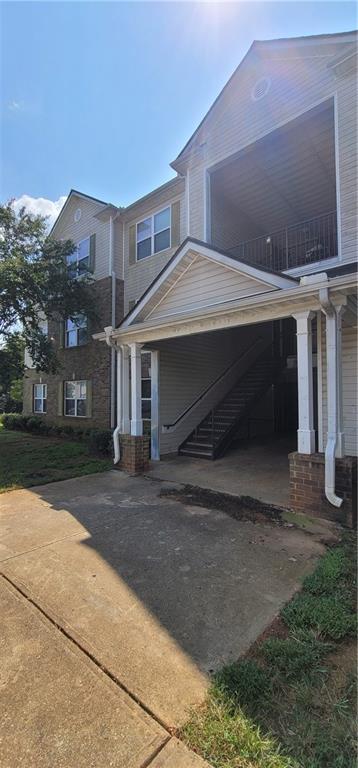 6304 Waldrop Place Decatur, GA 30034 - Photo 1 of 1 a front view of a house with a yard