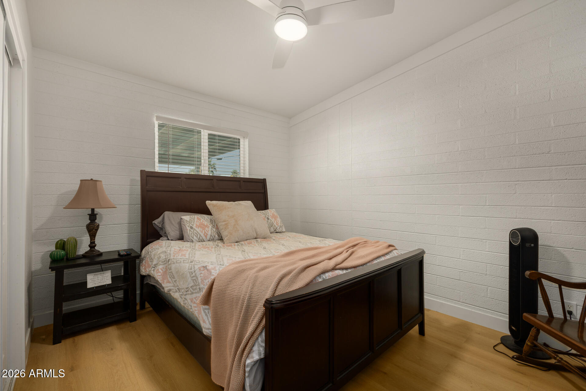 1560 North Freeman Mesa, AZ 85201 - Photo 14 of 22 a bedroom with a bed and a desk