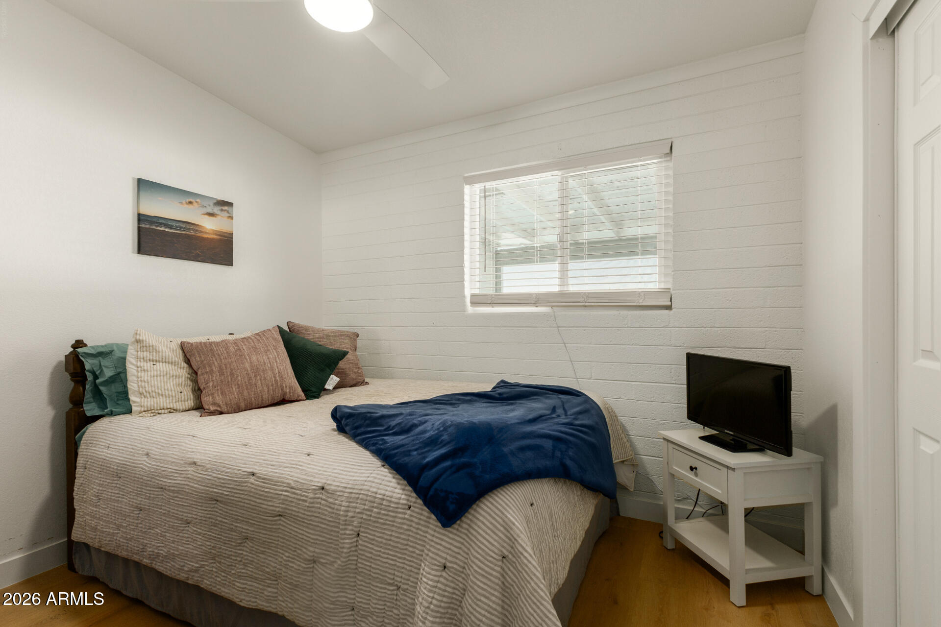 1560 North Freeman Mesa, AZ 85201 - Photo 15 of 22 a bedroom with a bed and a television