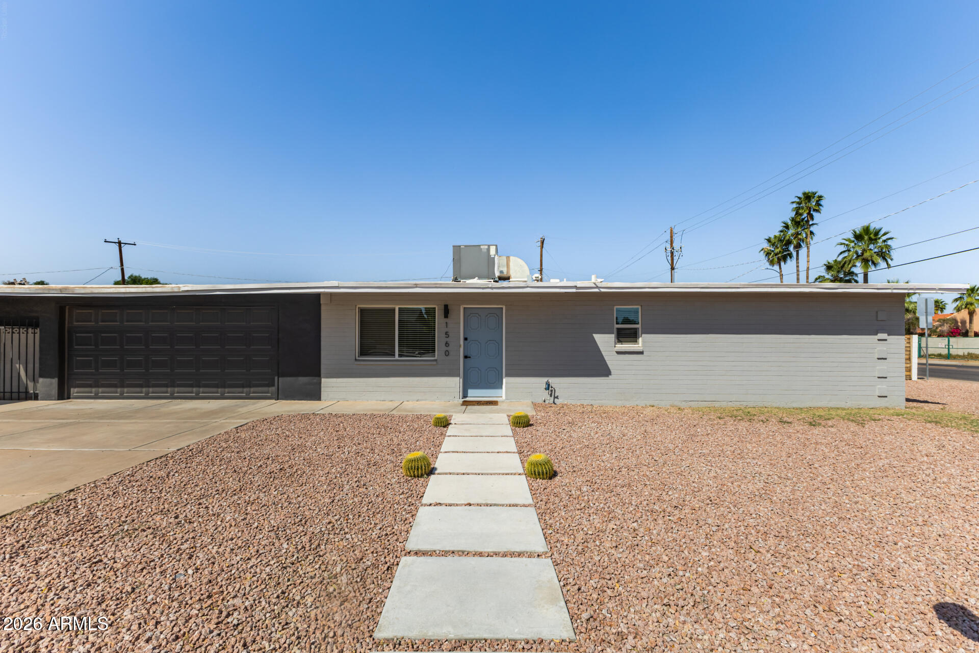 1560 North Freeman Mesa, AZ 85201 - Photo 18 of 22 a front view of a house with a yard