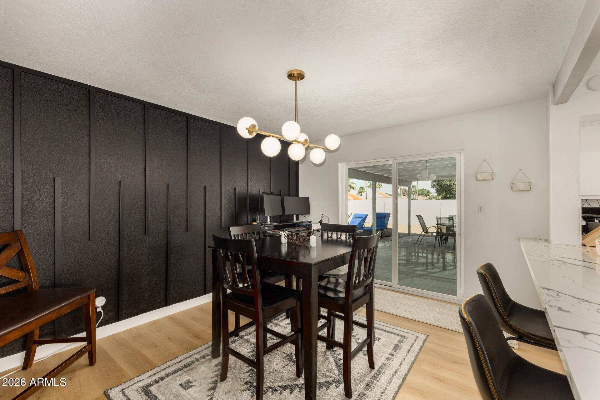1560 North Freeman Mesa, AZ 85201 - Photo 7 of 22 a view of a dining room with furniture and chandelier