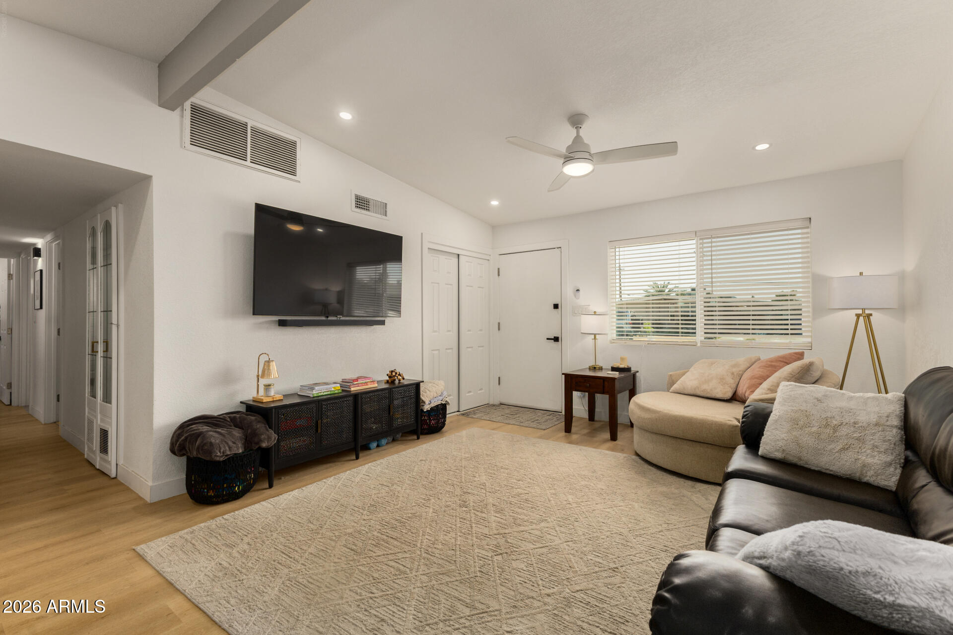 1560 North Freeman Mesa, AZ 85201 - Photo 10 of 22 a living room with furniture and a flat screen tv