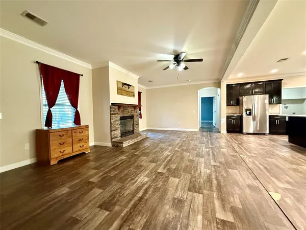 a view of livingroom with furniture and a flat screen tv
