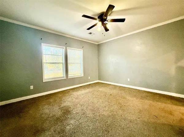 an empty room and window