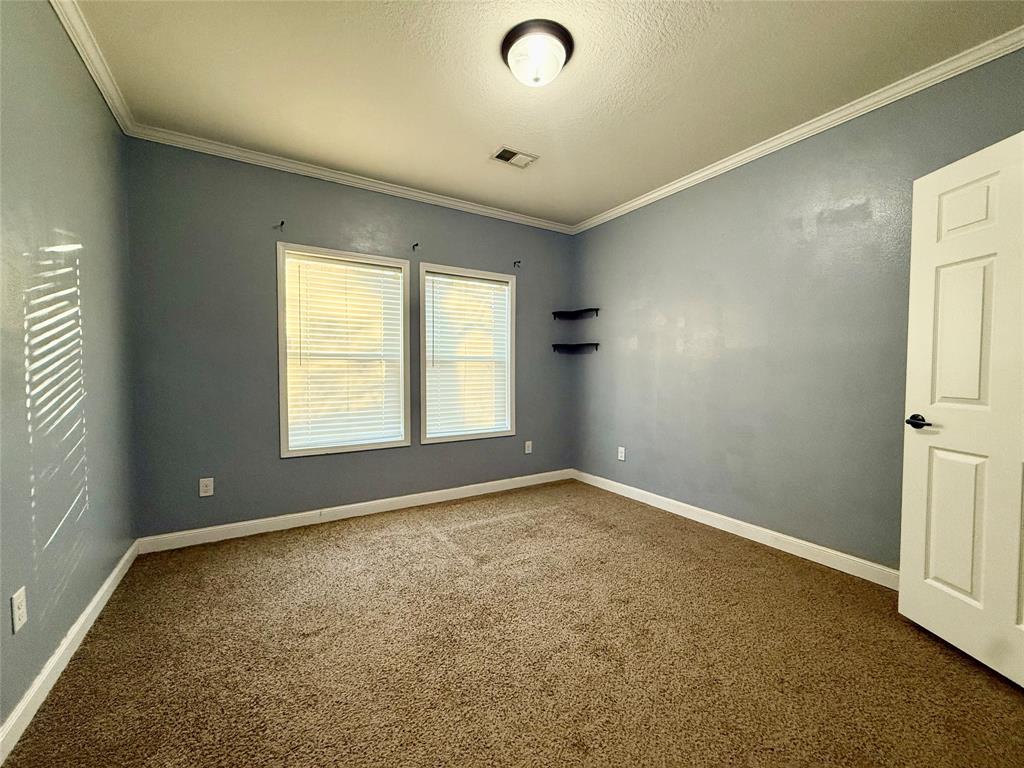 159 Yellow Pine Road Sibley, LA 71073 - Photo 18 of 33 an empty room with windows