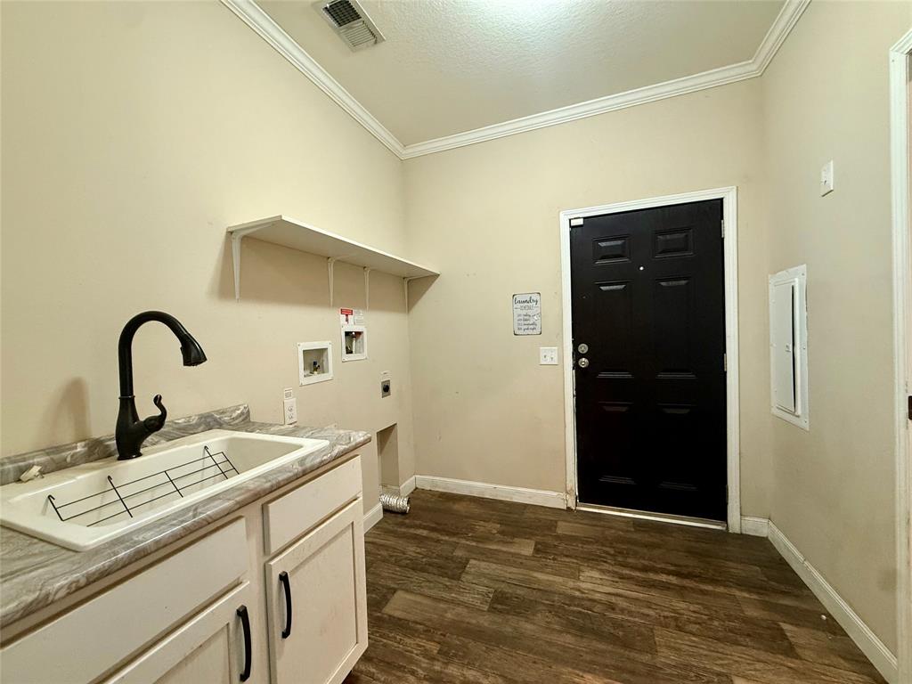 159 Yellow Pine Road Sibley, LA 71073 - Photo 23 of 33 a kitchen with a sink and a refrigerator