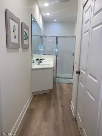 a view of a refrigerator in a kitchen