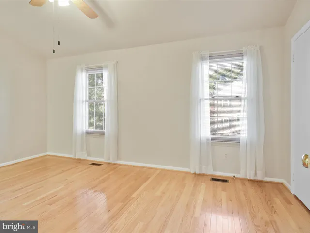 an empty room with window