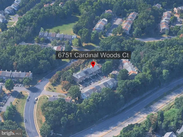 a view of a house with a street