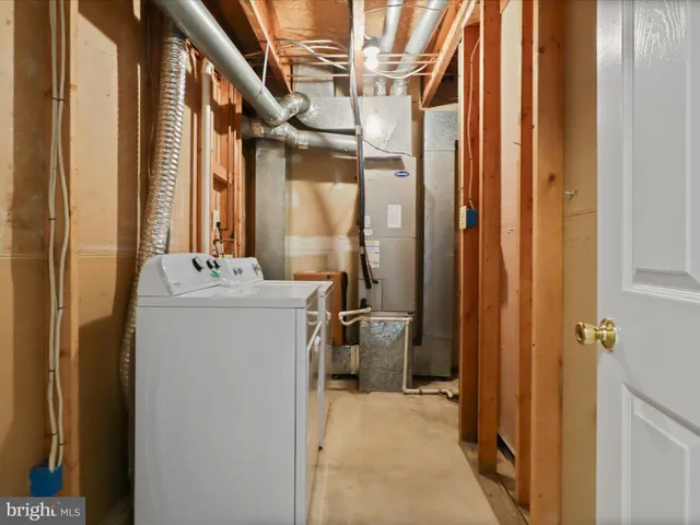 a utility room with a washer and dryer