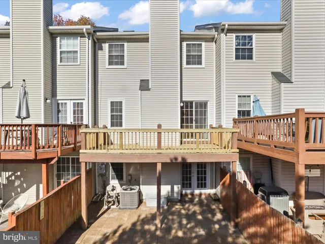 a view of a brick building with many windows