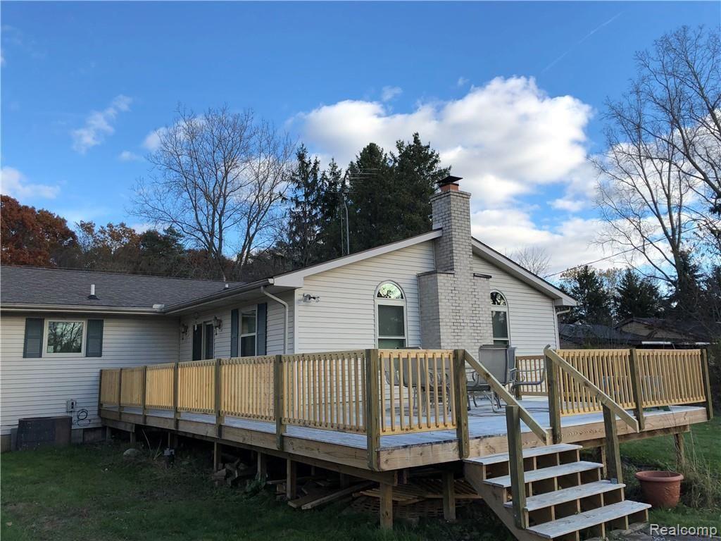 9579 Oak Grove Road Howell, MI 48855 - Photo 26 of 33 deck 2.jpeg