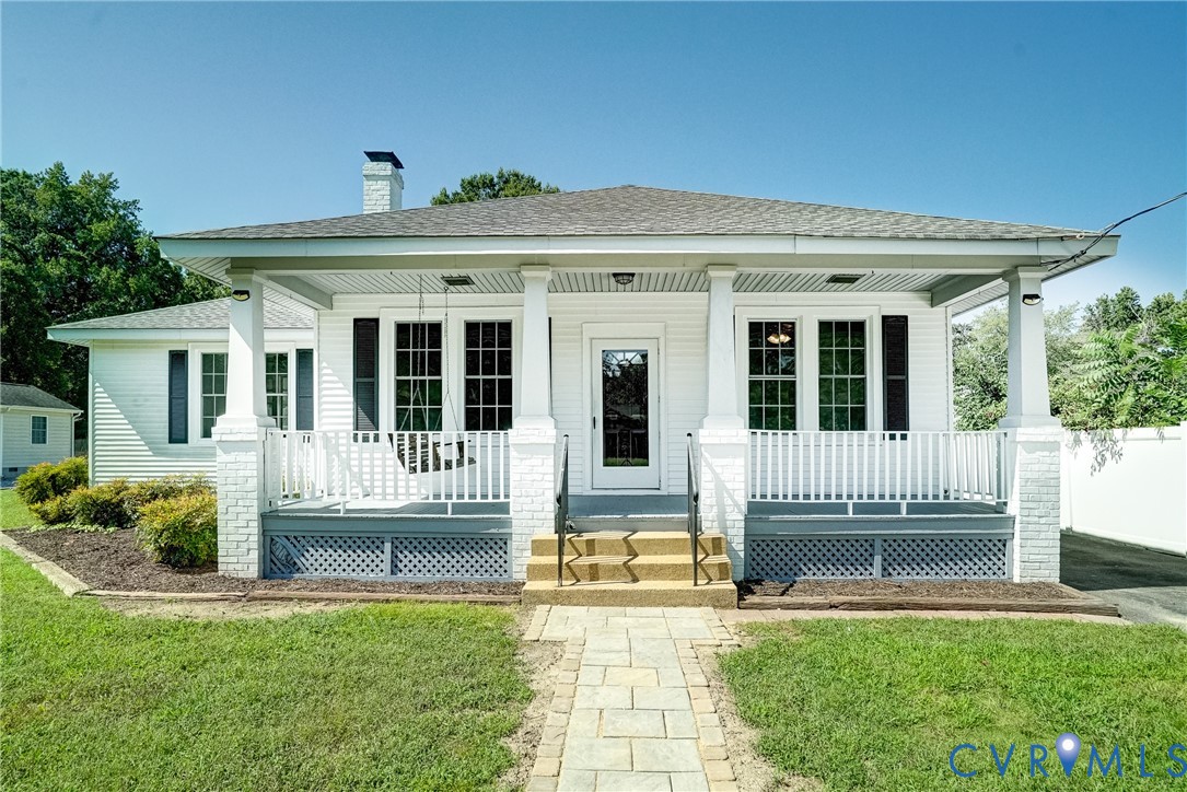 10024 Washington Road Glen Allen, VA 23060 - Photo 2 of 47 White siding exterior with a covered front porch f